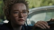 Alex’s mother stops at Justine’s window with scissors in Weapons (Image via YouTube/@WarnerBros)